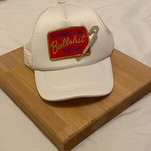 White Trucker Hat with Red and Gold Patch